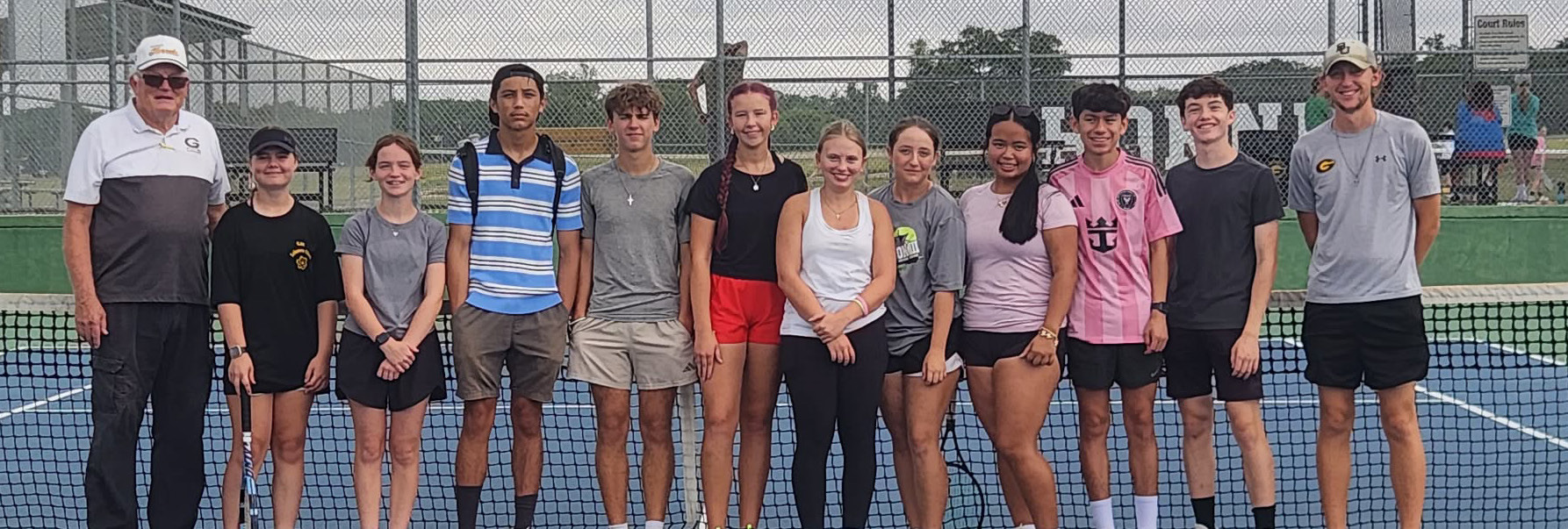 Varsity tennis players who participated as student coaches during the recent GISD tennis camp. Pictured left to right: Head Coach Wendell Jones, Lexi Bryant, Annabelle Lea, Elijah Tyson, Rogan Smith, Olivia Potts, Riley Butler, Paislee Moseley, Jillianna Kim, Donnovan Herrera, Quinton Ivy, and Assistant Coach Alex Scott. Courtesy photo