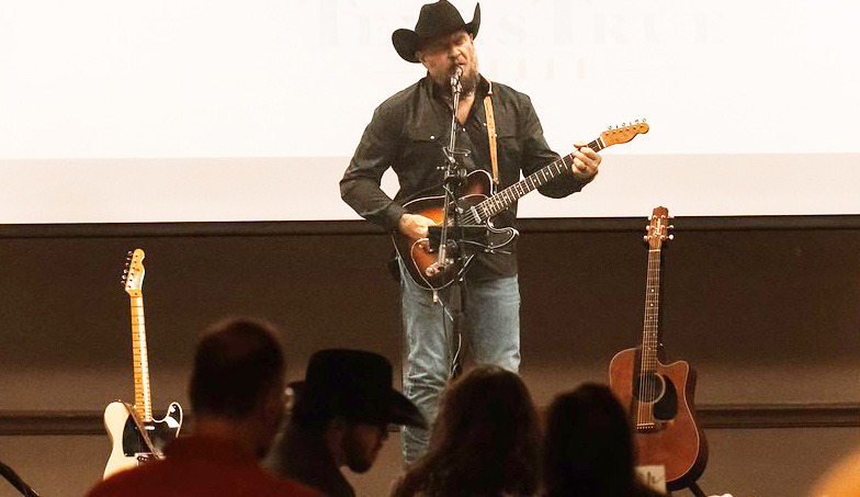 Musical artist Justin Todd Herod performs at the Mission Righteous Roots annual Spurs and Sparkles banquet on Saturday, Sept. 26. Photo courtesy of The Keepsake Story Photography