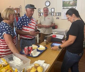 By early afternoon, the Bluegrass Kitchen had run completely out of food. Lines were stretched down the hallways of the former school with hungry guests. Courtesy Photo/Leo Corona
