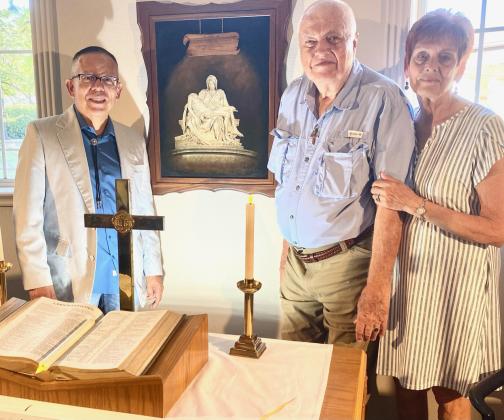 Artist Mario Ayala, pictured left, is shown with Don and Marcia Strieber who donated Ayala’s artwork to the Coryell Health Chapel. The Gatesville Messenger | David Scott