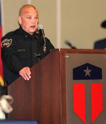 Gatesville Police Chief Jeffrey Clark, guest speaker for the Central Texas College Police Academy Basic Peace Officer Course Alpha Class of 2026 graduation ceremony, addresses graduates, family members and law enforcement officials, encouraging the new officers as they begin their careers in public service.