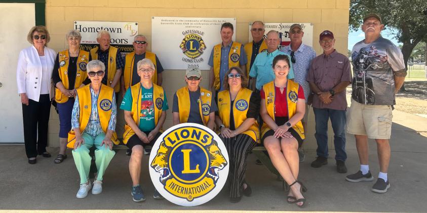 The Gatesville Lions Club members took a photo at the ballparks in recognition of the club’s $15,000 donation for sidewalks in 2025 in celebration of their 90th anniversary on July 8. COURTESY PHOTO