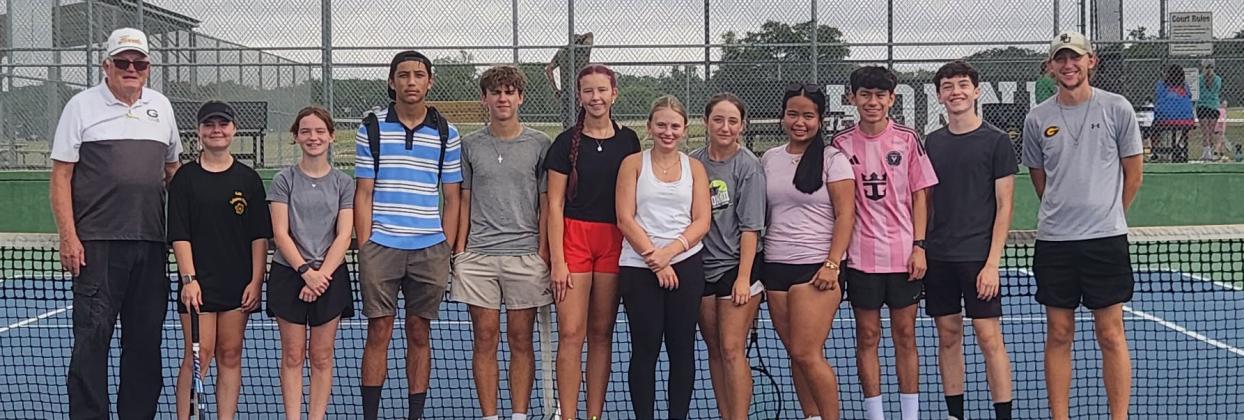 Varsity tennis players who participated as student coaches during the recent GISD tennis camp. Pictured left to right: Head Coach Wendell Jones, Lexi Bryant, Annabelle Lea, Elijah Tyson, Rogan Smith, Olivia Potts, Riley Butler, Paislee Moseley, Jillianna Kim, Donnovan Herrera, Quinton Ivy, and Assistant Coach Alex Scott. Courtesy photo