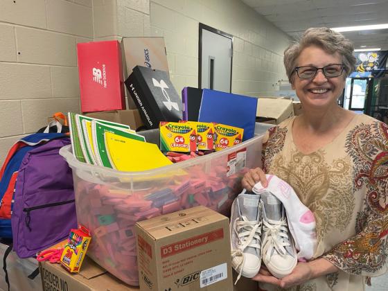 Michelle Martin displays “just a few” of the many items that can be found in the Resource Room at the Stinger Stash. Gatesville Messenger/ David Scott
