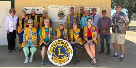 The Gatesville Lions Club members took a photo at the ballparks in recognition of the club’s $15,000 donation for sidewalks in 2025 in celebration of their 90th anniversary on July 8. COURTESY PHOTO