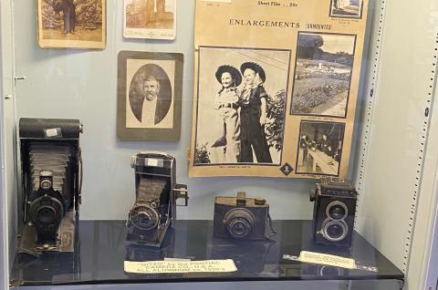 Display cases that show early day cameras and photographs from Coryell County.