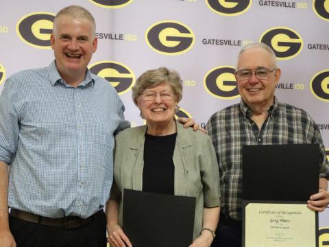 GISD superintendent Dr. Barett Pollard (left) poses with Betty Hines (middle) and Greg Hines (right) during the Hornet Legend spotlight portion of the Monday, July 20, school board meeting. GATESVILLE MESSENGER/Ally Hinkle