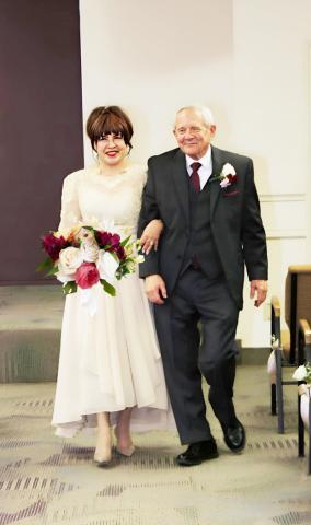 Gloria Veazey and Bruce Waite walk arm-in-arm down the aisle. Courtesy photo