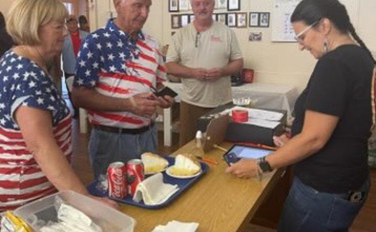 By early afternoon, the Bluegrass Kitchen had run completely out of food. Lines were stretched down the hallways of the former school with hungry guests. Courtesy Photo/Leo Corona