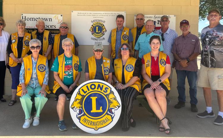 The Gatesville Lions Club members took a photo at the ballparks in recognition of the club’s $15,000 donation for sidewalks in 2025 in celebration of their 90th anniversary on July 8. COURTESY PHOTO