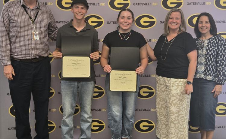From left to right: Superintendent Dr. Barrett Pollard, students Jadan Moore and Lilly Kinsey, high school choir director Cherith Wells and high school principal Liz Shoaf pose during the student spotlight portion of the Monday, Aug. 17, school board meeting. Ally Hinkle I The Gatesville Messenger