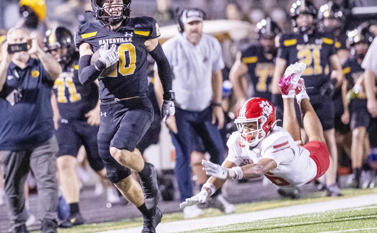 Grady Keeton eludes a diving Glen Rose defender on his way to the endzone during the Hornets win, last week at home. For coverage of the Gatesville and China Springs contest see the Friday Night Lite publication The Gatesville Messenger | David Morris