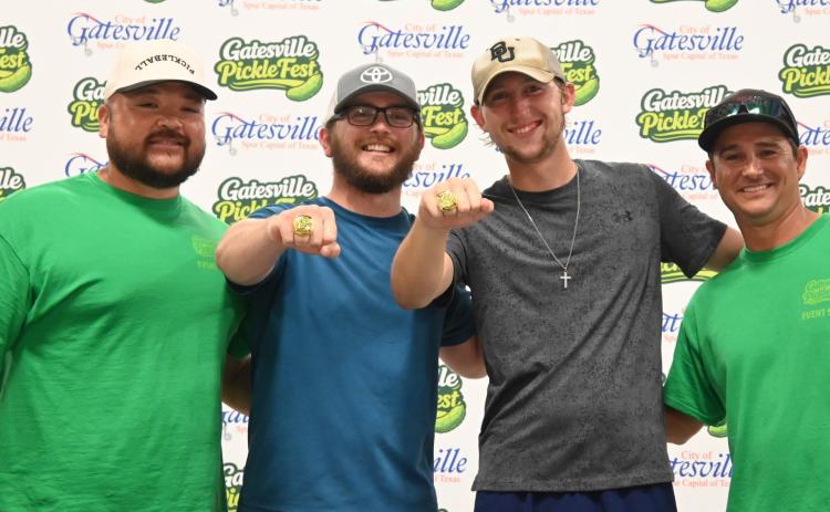 Winners of the Competitive Division are pictured center, Jeffrey Shokwiler and Alex Scott, along with event coordinators Marte Bailey and Seth Phillips. Courtesy Photo/Shea Harp