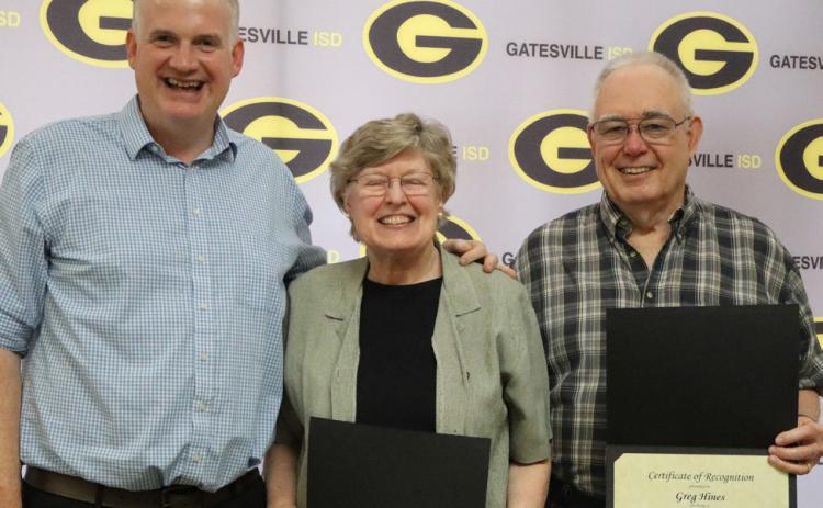 GISD superintendent Dr. Barett Pollard (left) poses with Betty Hines (middle) and Greg Hines (right) during the Hornet Legend spotlight portion of the Monday, July 20, school board meeting. GATESVILLE MESSENGER/Ally Hinkle