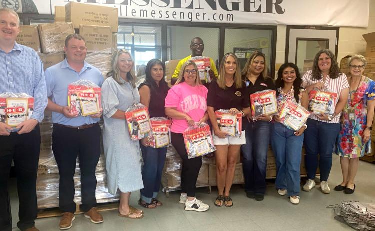 Pictured left to right are GISD employees, Gatesville Education foundation members, and H-E-B representatives: GISD superintendent, Dr. Barrett Pollard, Dan Davidson, Brittany Ellison, Velda Watson, Susie Meelbusch, Julie Matthews, HEB employees Teresa Moya and Micaela Klaich, Amanda Aguirre, and Michelle Martin. Gatesville Messenger/David Scott
