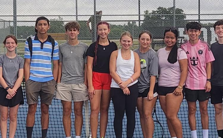 Varsity tennis players who participated as student coaches during the recent GISD tennis camp. Pictured left to right: Head Coach Wendell Jones, Lexi Bryant, Annabelle Lea, Elijah Tyson, Rogan Smith, Olivia Potts, Riley Butler, Paislee Moseley, Jillianna Kim, Donnovan Herrera, Quinton Ivy, and Assistant Coach Alex Scott. Courtesy photo