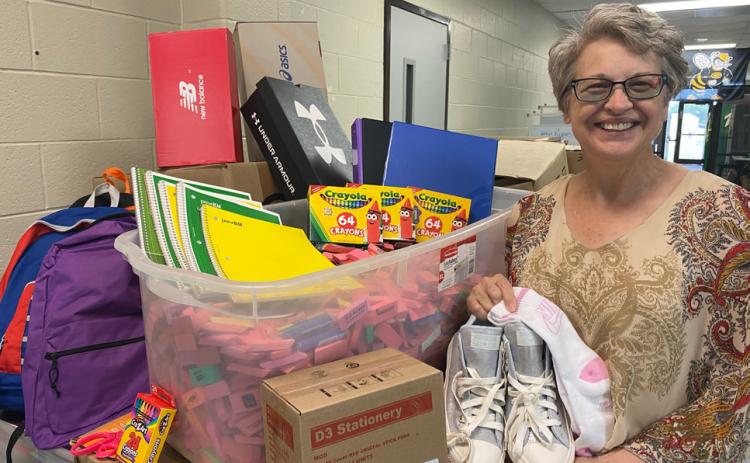 Michelle Martin displays “just a few” of the many items that can be found in the Resource Room at the Stinger Stash. Gatesville Messenger/ David Scott