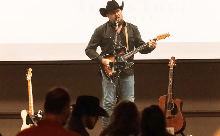 Musical artist Justin Todd Herod performs at the Mission Righteous Roots annual Spurs and Sparkles banquet on Saturday, Sept. 26. Photo courtesy of The Keepsake Story Photography